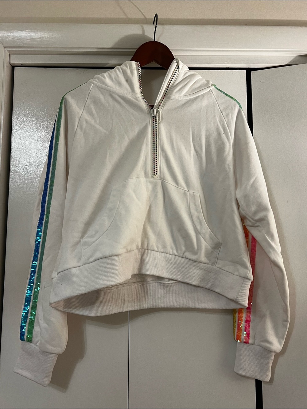 QUEEN OF SPARKLES White Cropped Hoodie with Rainbow Sequin Sleeve Stripes